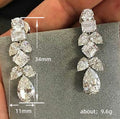 Clear Geometric Crystal Drop Earrings in Silver Tone view 5