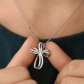 White Gold Twisted Mobius Pendant Necklace Clear Pave view 1