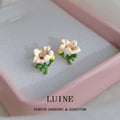White Flower Green Stem And Pink Center Stud Earrings For Women view 4