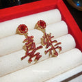 Red Crystal Chinese Character Drop Stud Earrings with Metal Tone Details view 1