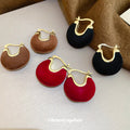 Gold Tone Flocked Disc Hoop Earrings in Black Red and Brown view 3