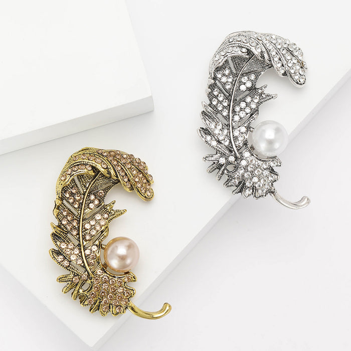 Curled Crystal Feather Brooch With Faux Pearl Accent