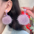 Purple Heart Bow and Fuzzy Pom Pom Long Drop Earrings view 1