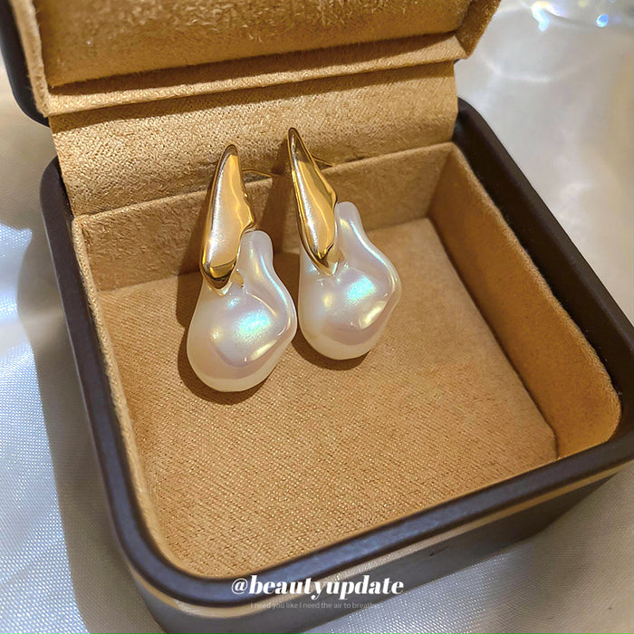 Gold Tone Organic Pearl Drop Earrings With Sculpted Top Detail