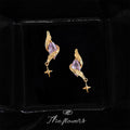 Gold Tone Purple Faceted Stone Wing And Star Drop Stud Earrings view 6