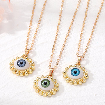 Gold Tone Realistic Eye Pearl Border Pendant Necklaces in Three Colors