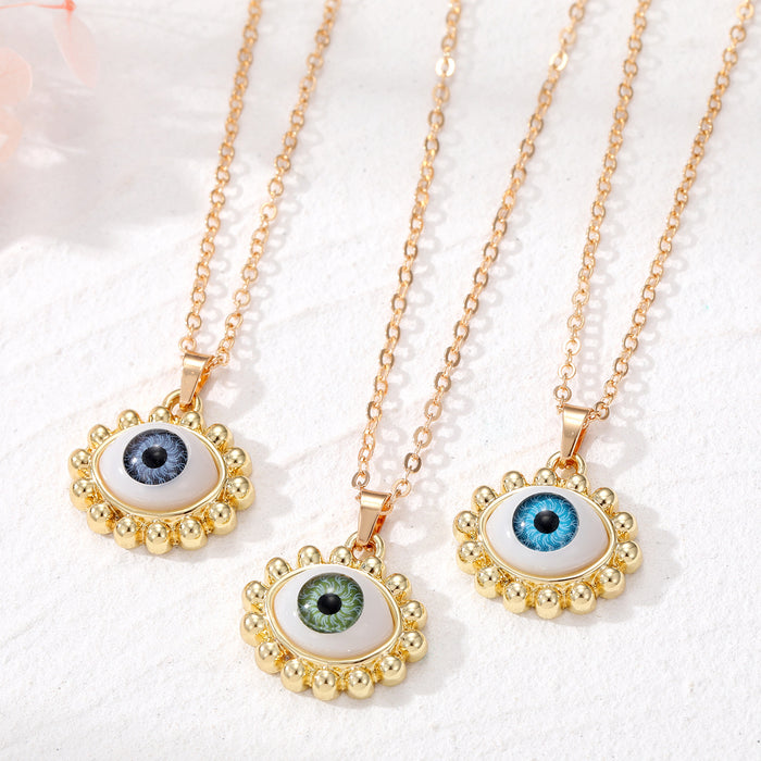 Gold Tone Realistic Eye Pearl Border Pendant Necklaces in Three Colors