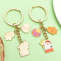 Christmas Charm Keychains Featuring Red Bow Across 81 Pictured Variations view 2