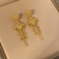 Gold Filigree Medallion Multi Chain Tassel Earrings view 2