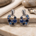 Blue Faceted Stone Open Oval Silver Tone Dangle Earrings view 6