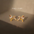 Gold Bow Stud Earrings Wine Enamel Clear and Amber CZ view 6
