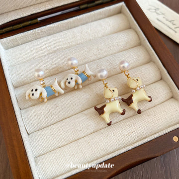 Cream Dog and Pearl Drop Stud Earrings with Detailed Finish