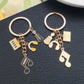 Yellow-Led Guitar Piano Violin and Headphone Charm Keychain Collection view 3