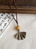 Long Cord Pendant Necklace in Four Wood and Metal Designs view 9