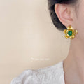 Gold Textured Flower Stud Green Cabochon Center Earrings view 2