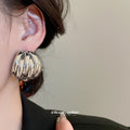 Layered Ribbed Metal Dome Stud Earrings in Two Finishes view 3
