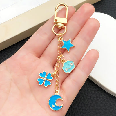 Overview showing the available color and design variations of the celestial floral and sweet metal clasp keychain