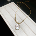 Gold Tone Oval White H Letter Charm Pendant Necklace view 6