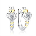 Two Tone Heart Huggie Earrings Silver Gold Clear Stone view 1