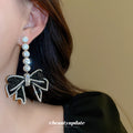Black Bow Drop Earrings with Clear Crystal Trim and Pearl Accents view 3