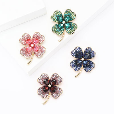 Front view showing the four leaf clover brooch in four crystal color variations