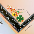 Glitter and Cat Eye Four Leaf Clover Keychains in Two Distinct Styles view 4