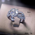 Silver Tone Round CZ Four Prong Twisted Pave Finger Ring view 3