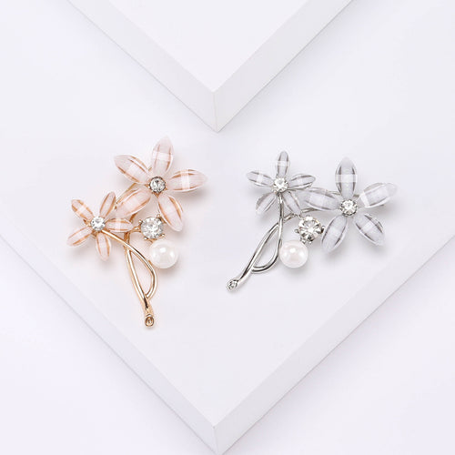 Front view of delicate acrylic flower branch with translucent petals and metal stems
