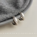 Silver Tone Triple Line Crossed Chunky Hoop Earrings view 1