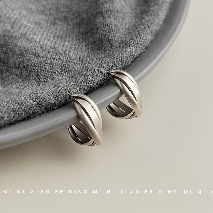 Silver Tone Triple Line Crossed Chunky Hoop Earrings