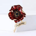 Red Enamel Poppy Brooch With Lest We Forget Banner view 2