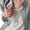 Pointed Heart Pendant Necklace in Gold and Silver Tones view 5