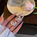 White Pearl and Crystal Floral Basket Hoop Earrings view 6