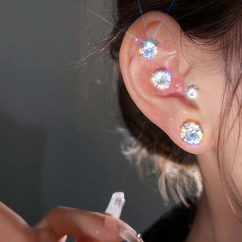 Magnetic Round Crystal Ear Cuffs Four Colors Polished Metal Jewelry shown on a neutral display