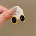 Gold Multi-Strand Oval Cabochon Necklace and Stud Earrings view 9