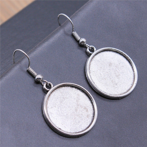 Round Cabochon Tray Dangle Earrings in Two Antique Finishes shown in image 1 with plain round trays on fishhook ear wire