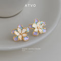 Gold Tone Iridescent Lavender Flower Clear Stone Stud Earrings view 6