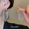 Gold Tone Crescent Earrings with Cascading Crystal Fringe view 2