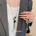 Heart Pendant Necklaces with Silver Tone Tassels in Two Colors view 1