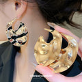 Sculpted Wavy Disc Stud Earrings in Gold and Silver Tone view 2