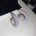Silver Mesh Hoop Earrings with Pearl Centers with Polished Metal Details view 6