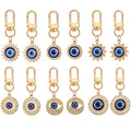 Twelve Piece Gold Tone Rhinestone Evil Eye Clip Keychain Set view 1