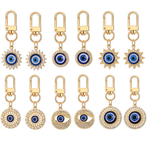 Twelve Piece Gold Tone Rhinestone Evil Eye Clip Keychain Set