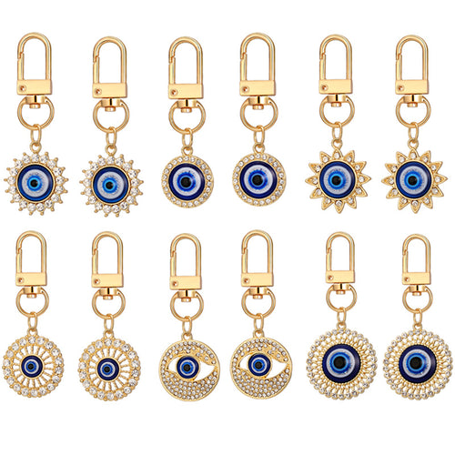 Main product view of twelve Piece Gold Tone Rhinestone Evil Eye Clip Keychain Set
