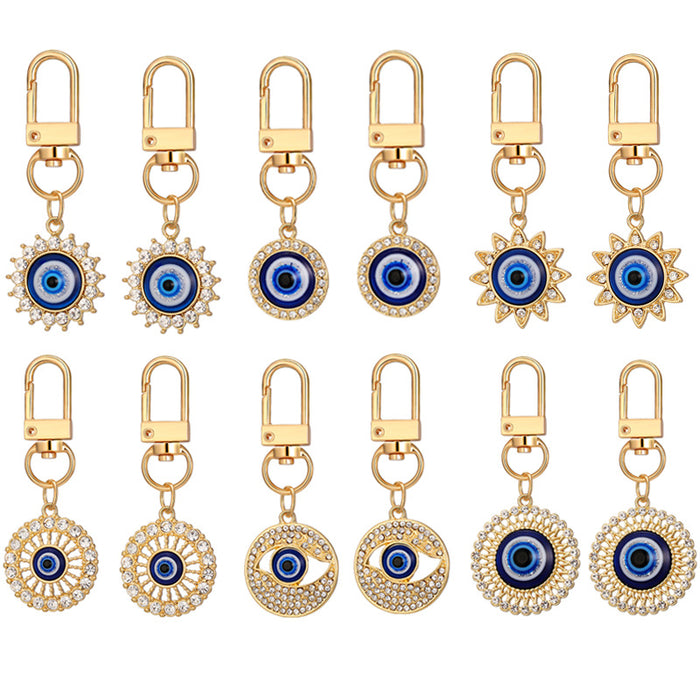 Twelve Piece Gold Tone Rhinestone Evil Eye Clip Keychain Set
