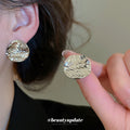 Rippled Coin Stud Earrings in Gold and Silver Tone Finishes view 4