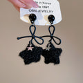 Bow and Fuzzy Star Drop Earrings in Black and White view 7