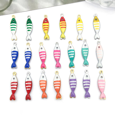 Colorful bird charms arranged on a light background