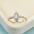 Marquise Halo Solitaire Side-Stone Ring In Polished Gold Tone view 3