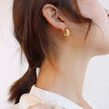 Crossed Twist C-Shape Hoop Earrings In Gold Or Silver Tone view 6